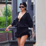 Rihanna In A Hoodie Dress Exposing Her Sexy Legs And Tits