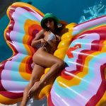 Vanessa Hudgens In A Mini Bikini On A Giant Inflatable Butterfly (6 Photos)