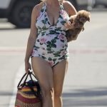 Katy Perry Showed Her Baby Bump In A Swimsuit (8 Photos)