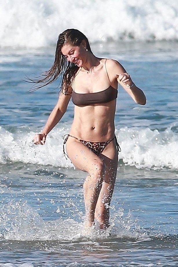 Gisele Bundchen Has Fun On The Beach In A Revealing Bikini