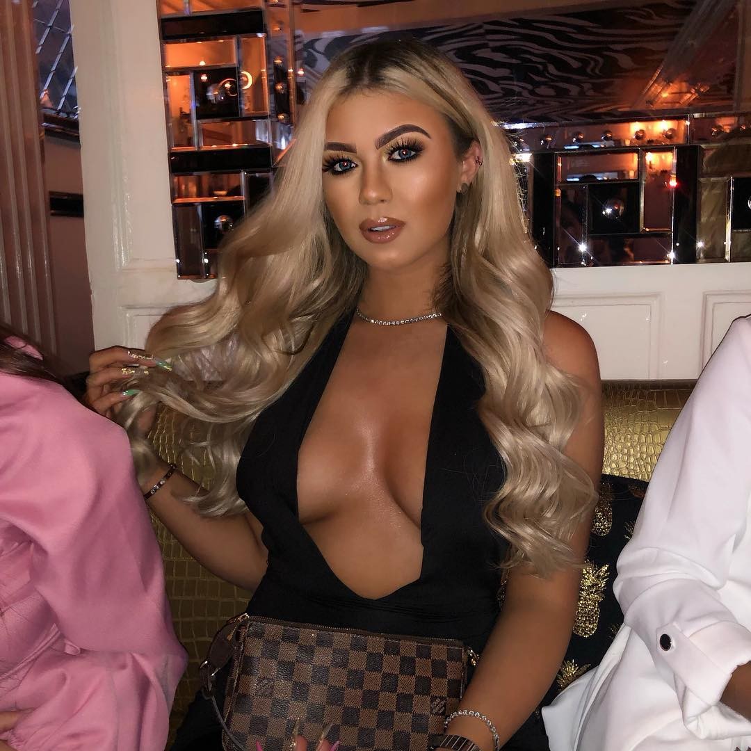 Belle Hassan Deep Cleavage