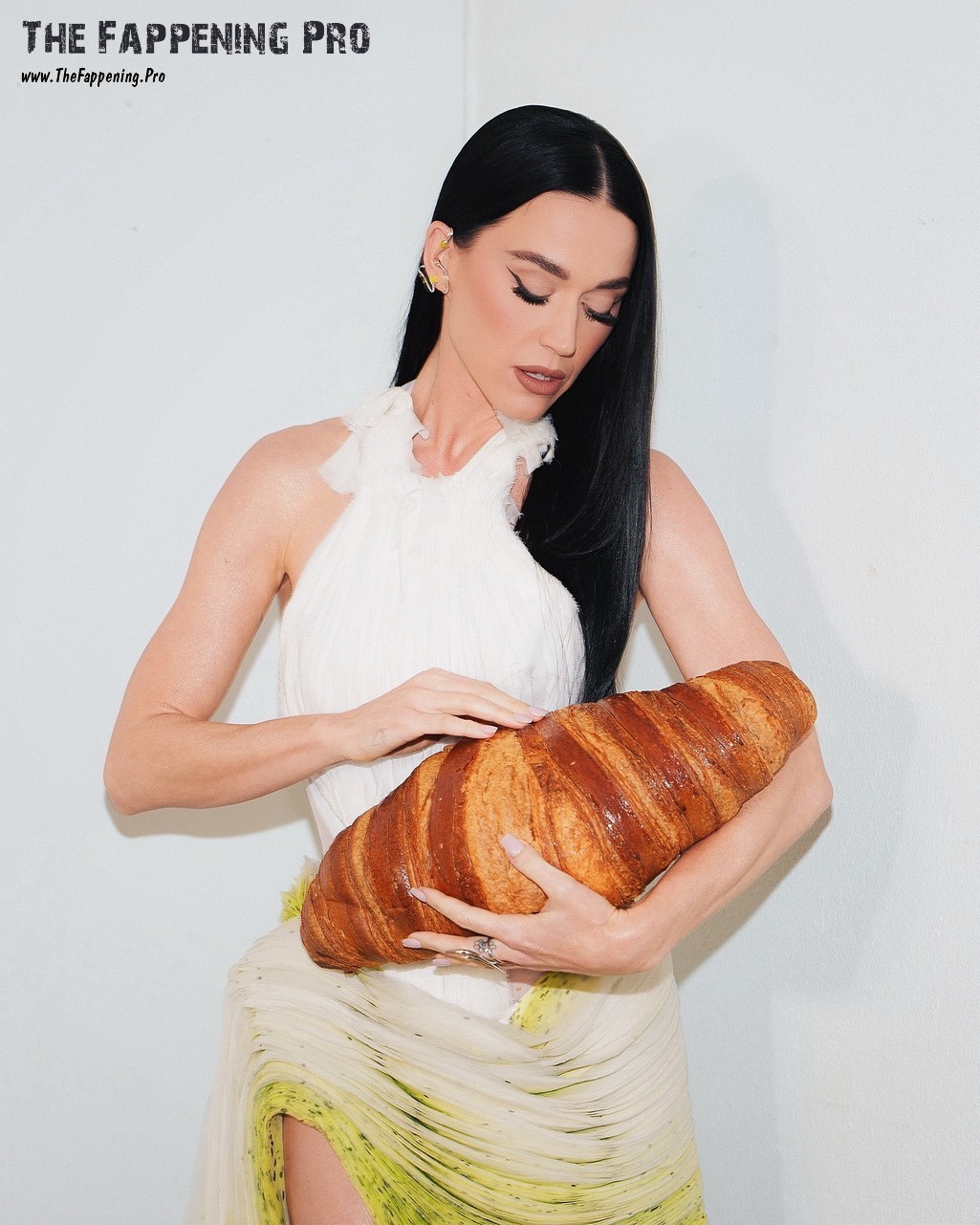 Katy Perry In France With Huge Croissant
