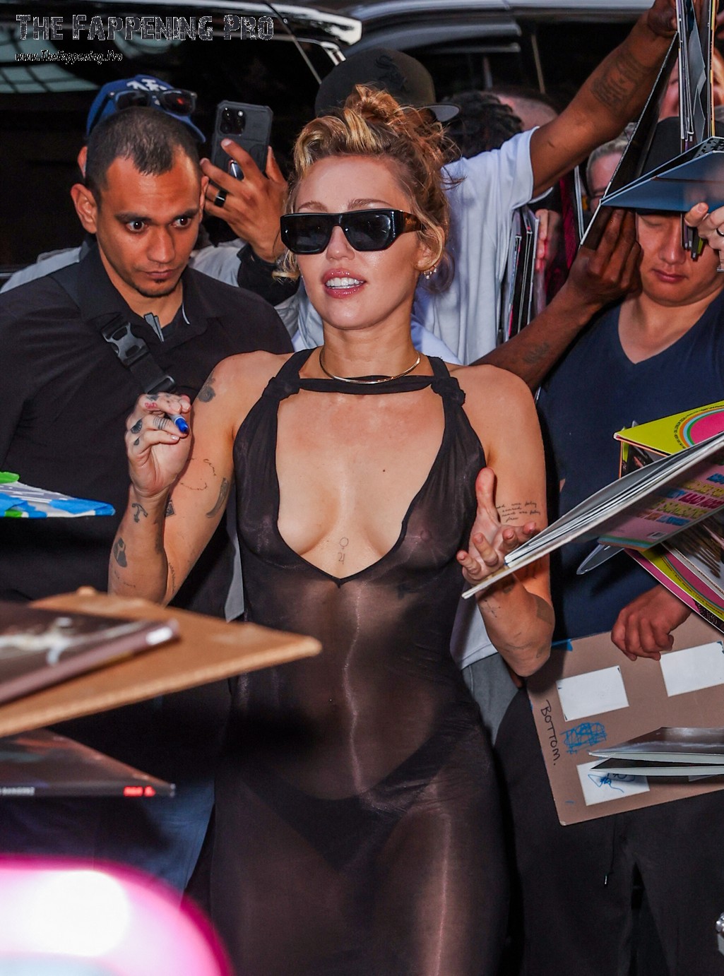 Miley Cyrus Exposed Tits In See Through Dress