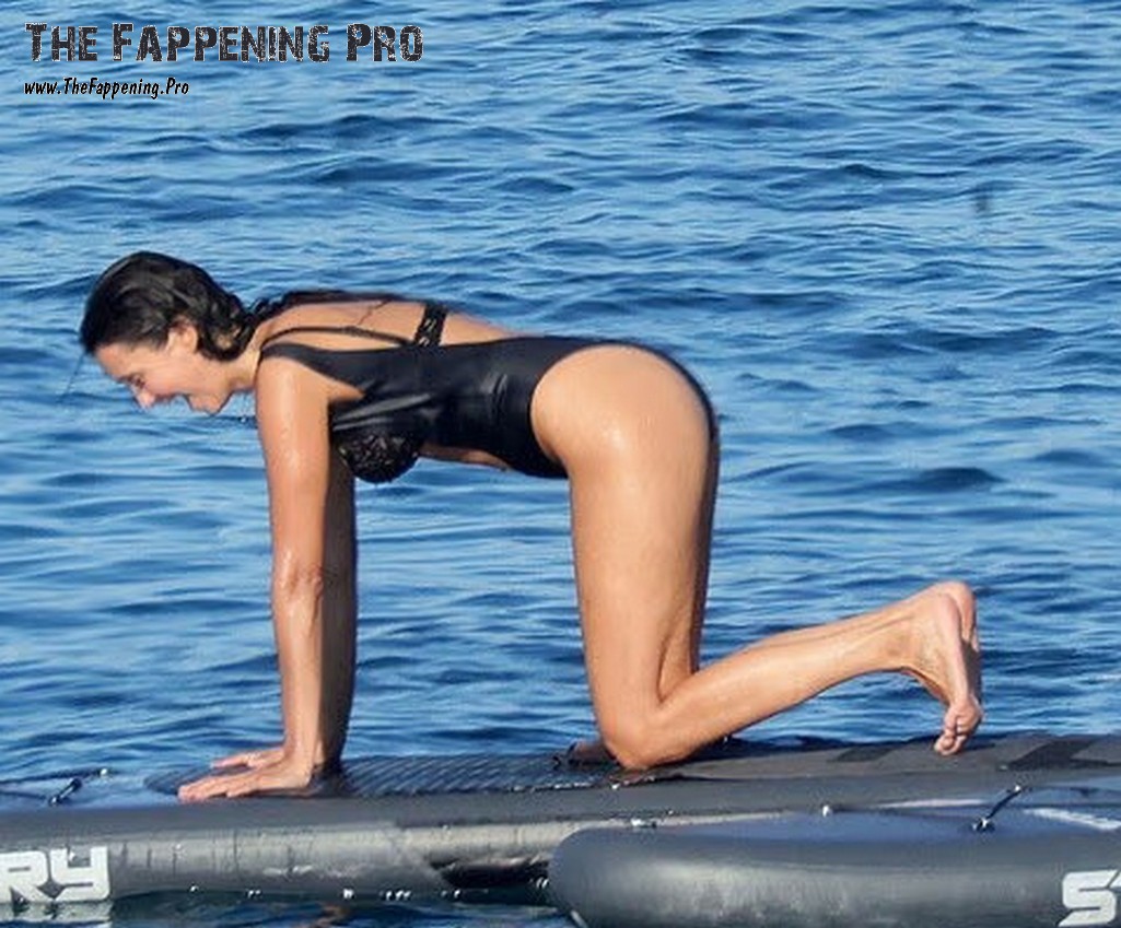 Nina Dobrev Kneeling Barefoot