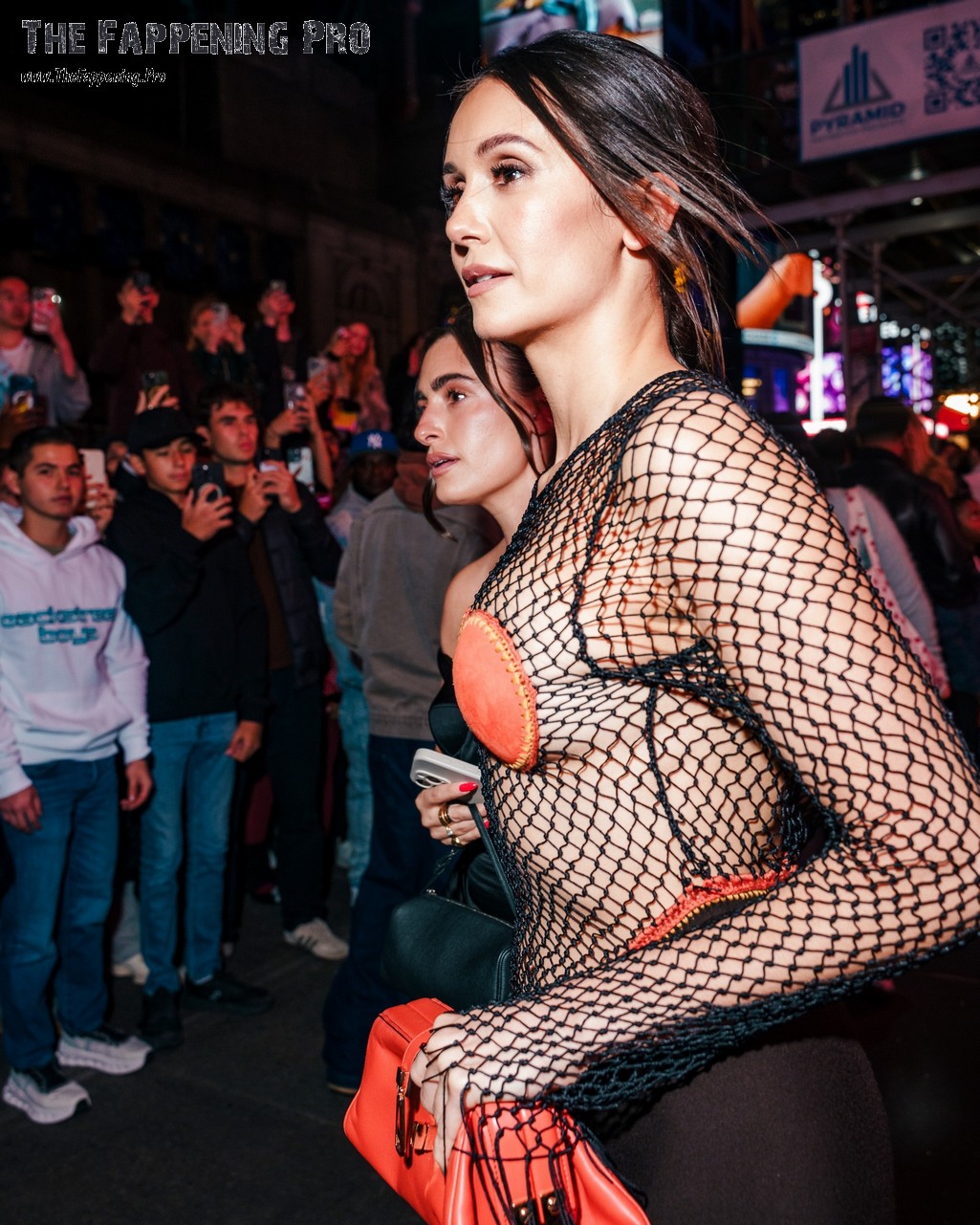Nina Dobrev Sideboobs